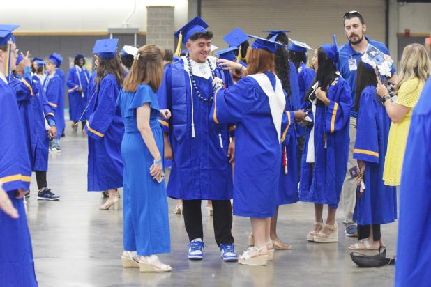 CCHS class of 2025 members prepare to walk at the May 23 commencement ceremony.