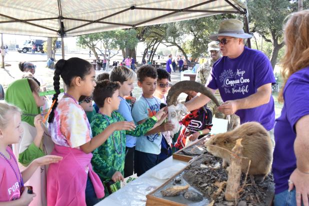Kids check out Fort Hood’s Biodiversity booth at a past Eco Harvest. This year’s event is set for Saturday, Oct. 18 from 10 a.m. until 1 p.m. at Ogletree Gap Park. 