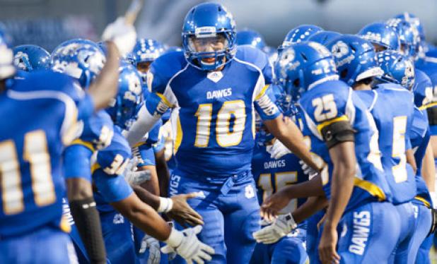 Copperas Cove senior quarterback Manny Harris runs out on the field to awaiting teammates and a rousing ovation by Bulldawg fans prior to their 35-20 homecoming victory over the Killeen Kangaroos Friday at Bulldawg Stadium. Cove travels to Belton tonight to take on the Tigers.