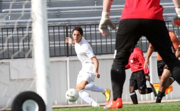 Copperas Cove’s Devante Purnell takes a shot on goal during the Bulldawgs’ third-place game against the Hutto Hippos Saturday at Leo Buckley Stadium. The Bulldawgs improved their season record to 4-4.