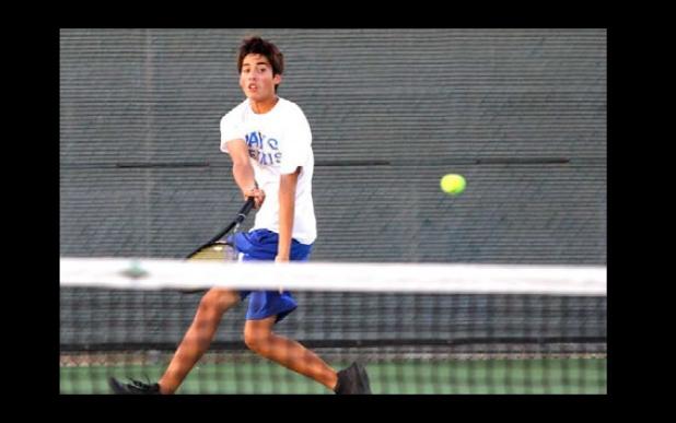 Copperas Cove’s James Llanos hits a running forehand during his singles match against Belton’s Travis Faris as part of the 12-6A matchup between the Bulldawgs and Tigers on Tuesday at the Dawg Tennis Center in Cove.