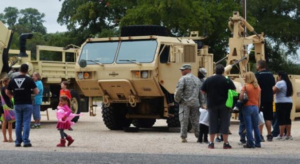 Families look at vehicles on display from the First Cavalry’s 115th Brigade Support Battalion, 1st Brigade Combat Team during the annual Spurfest celebration in Gatesville.
