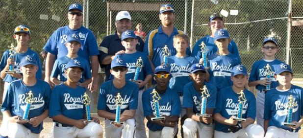 The 12U Cove Royals pose with the District Champion trophies after dominating the field in he District 4 12U Texas Teenage Baseball Tournament last week in Lampasas. The Royals out-scored their opponents 48-2 en route to the title.