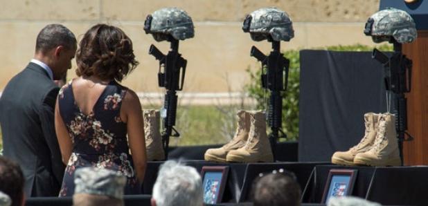 United States President Barack Obama and Mrs. Michelle Obama pay their respects to the fallen Soldiers after a memorial ceremony at Fort Hood Wednesday.