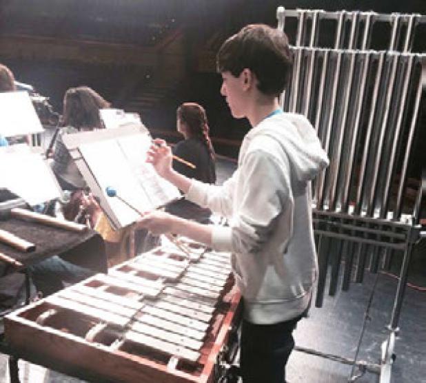 S. C. Lee Junior High student, Alex Rios, marks his part during rehearsals at the Texas Music Educators Association’s Region 8 All-Region Clinic on Saturday.