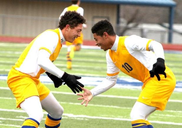 Copperas Cove’s Devante Purnell celebrates a goal with teammate Perry Cannon Jr. (10) during their 3-0 shutout of Salado during a scrimmage tournament Saturday at Bulldawg Stadium. Cove won both games in the tournament with the second coming in a 2-0 blanking of Connally.