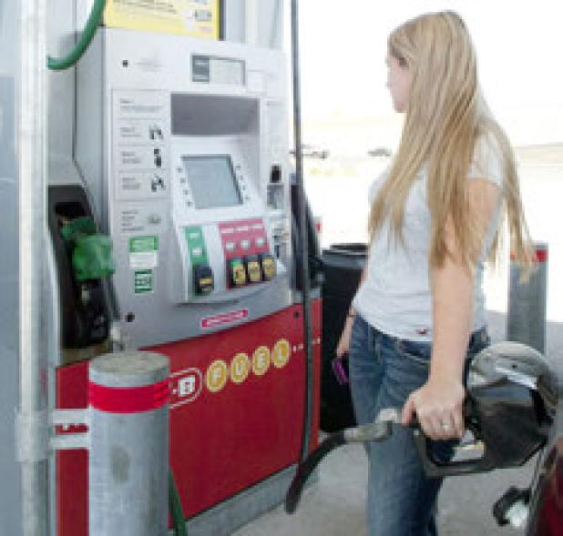 Rebecka Downing of Copperas Cove pumping gas at the H-E-B Plus.