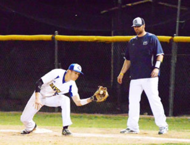 Bryce Delano makes the play at first, beating the Greywolf batter from occupying the base.