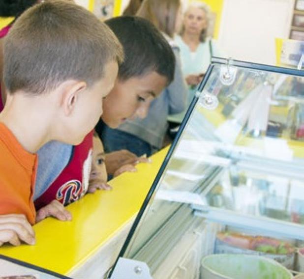 Kids line up at The Waffle Cone to selected their favorite flavor of ice cream. The ice cream parlor offers more than 20 different flavors and unique artisan sundaes.