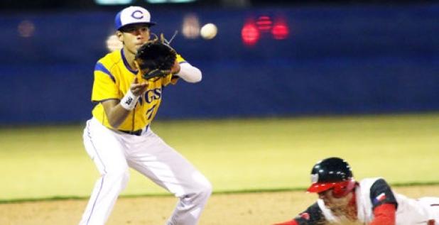 Copperas Cove third baseman Michael Hays awaits the throw from catcher Michael Sizemore as Waco High’s Cody McDonahew slides into base in the fourth inning Friday in Waco.