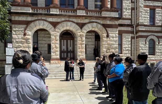  Lisa Moreno of Copperas Cove opens a gift of windchimes given to her in memory of her son, Manuel Moreno, on Friday morning. Lisa and her other son, Joe, were in Coryell County court giving statements to the court regarding the loss of Manuel due to Cody Ray Vaughan, who pled guilty to intoxication manslaughter as well as collision involving death - fail to stop and render aid.. 