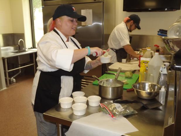 CCLP/PAMELA GRANT  Laura Garrett works on preparing a watermelon radish aioli for CTC’s “Iron Chef” competition.

