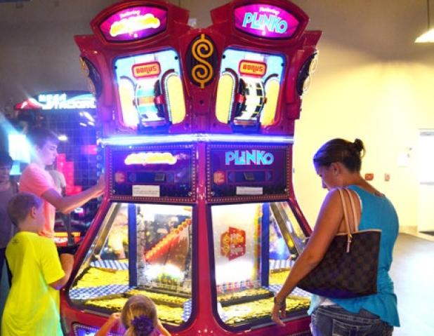 Guests play on one of the many games offered at MAKS Family Fun & Event Center. MAKS will begin construction on August 20 for new batting cages and go cart track, which will take three to four month to complete.