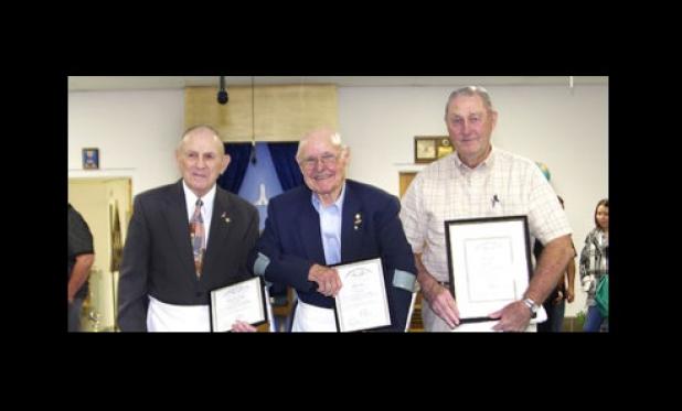 Walter L. Prugh, left, Mayor John A. Hull and Lynn C. Cox received their 50-year distinguished member awards from Mt. Hiram Masonic Lodge 595 in January 2013.