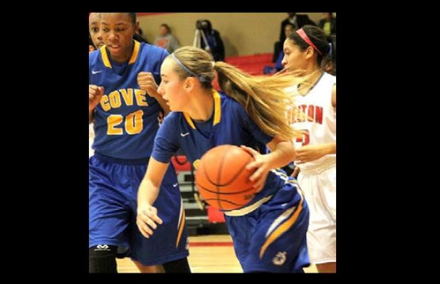 Cove senior Angel Mullen retrieves a rebound to start a fast break during the Lady Dawg’s 13-0, fourth quarter run in Cove’s 41-27 victory in Belton Tuesday night. The Lady Dawgs return to action tonight at home aganst Elliosn for Teacher Appreciation Night.