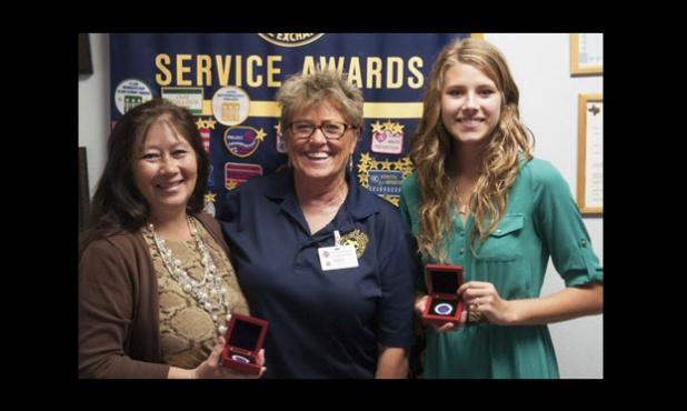 Chamber of Commerce President Betty Price,left, updated the Morning Exchange Club on state of the Chamber at the request of Marty Smith,center. Rabbit Fest royalty Kelsey Dane shared her platform of volunteer service with the club.