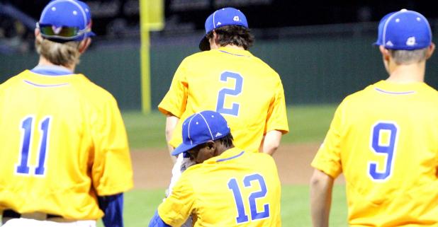 Copperas Cove lefty ace Jaylen Smith (12) picks up righty ace Cameron Johnson as Colby Jost (11) and Cam Petet (9) look on after Johnson’s no-hitter in a 2-0 shutout of Ellison Tuesday at Bulldawg Field. Johnson struck out 12 of the 26 batters faced in 6 2/3 innings on the bump.