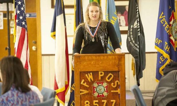 Copperas Cove Senior Mikayla Miller reads her Voice of Democracy essay during the awards ceremony Saturday for VFW Post 8577. Miller received a $500 scholarship from the post that will be used for tuition and books.