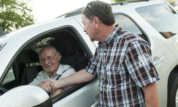 Copperas Cove Mayor John Hull stops by the old city hall offices to congratulate Kirby Lack on his victory, welcoming him to the city council after winning the Place 5 election.