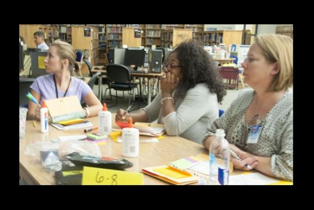 New teachers gather for the yearly school new teacher orientation. Some different strategies and methodologies to help the teachers during the year include content, classroom management, state standards, organization, assessing students, and different techniques.