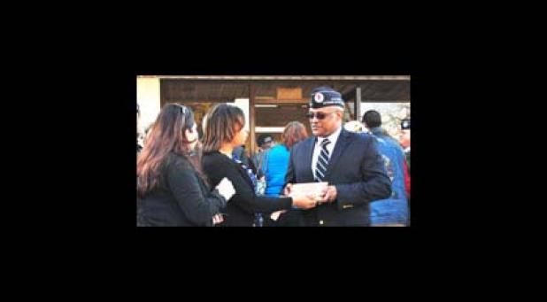 Star Group Veterans Helping Veterans president Jonathan Haywood shakes hands with members of the Copperas Cove Chamber of Commerce after the grand opening ceremony and ribbon cutting Thursday evening.
