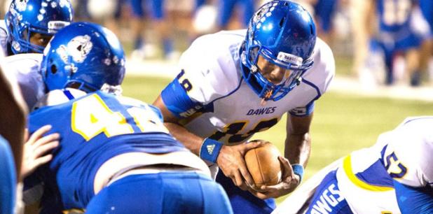 Copperas Cove quarterback DeVon Hopkins-Phelps follows center Colton Tuiasosopo into the end zone for one of his two rushing touchdowns during the Bulldawgs 51-40 win over Schertz-Clemens on Friday in Schertz.