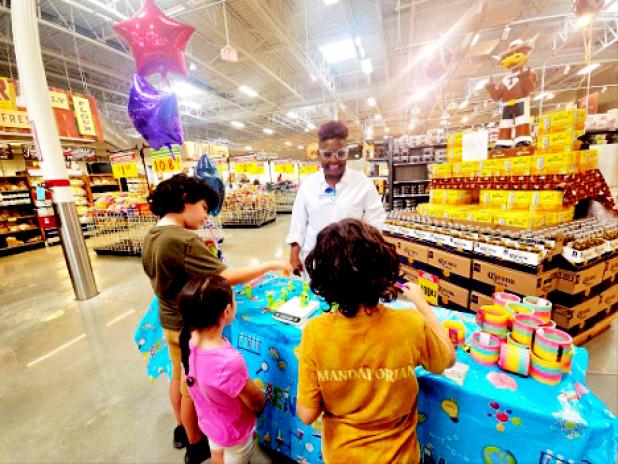Children explore educational STEM stations at the Copperas Cove H-E-B Kids Day event.