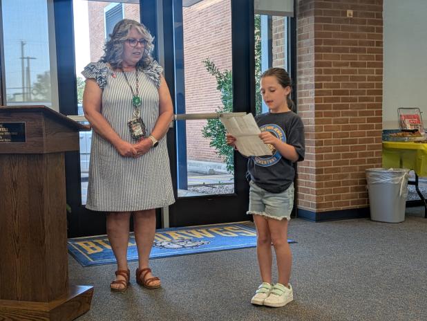 Fairview/Jewell Elementary School librarian listens to a student read during last Thursday’s Salute to Literacy held by CCISD.