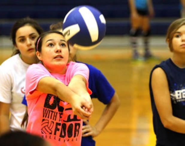 Incoming freshman McKenna Miller passes the ball during the 2014 Lady Dawgs volleyball camp Wednesday at Copperas Cove High School.