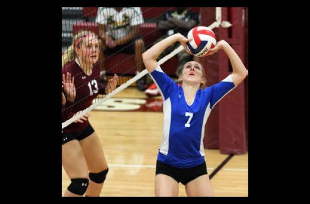Copperas Cove junior Katy Ranes sets the ball during the Lady Dawgs 3-0 sweep of the Lady Roos on Tuesday. Cove qualified for the playoffs with the win.