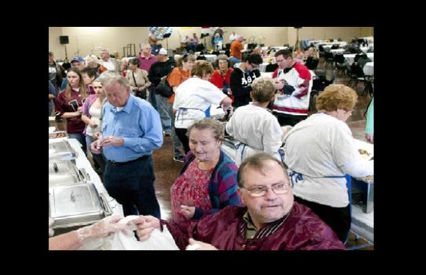 Hundreds of visitors waited in line for the coveted Mickan sausage that is only available for one day of the year.