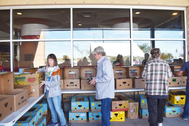 File photo. -  Volunteers sort through food donations collected at H-E-B Plus! in Copperas Cove during last year’s Food For Families Food Drive. This year’s event is set for Friday, Nov. 21.