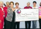 File Photo - Members of the Fort Hood Spouses Club present a check for $2,000 to the Coryell County Rainbow Room based in Copperas Cove. The facility provides clothing, shoes and more to children who have been removed from their home by Child Protective Services.