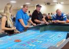 CCLP/BRITTANY FHOLER - People played Craps at the Inaugural Buyer’s Club Casino Night held Saturday night at the Copperas Cove Civic Center.