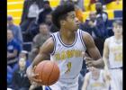 CCLP/TJ MAXWELL - Cove sophomore Quinton Ford drives to the basket during the Dawg Pound Showdown last weekend. Ford scored a team-high 19 points, including 12 in the first period, in Monday’s 66-51 loss to the Temple Wildcats.