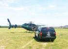 COURTESY PHOTO - A helicopter pilot was using the open green space at House Creek Elementary School to land in a non-emergency situation. In this photo, a Copperas Cove police department officer parked a department SUV beside the helicopter to speak to the pilot.