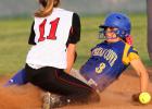 Copperas Cove’s Eliana Doubleday slides in to second base in front of Harker Heights’ Destiny Perry in the first inning of their 18-2 blowout of Harker Heights on Friday