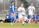 CCLP/LEE LETZER -- Cove senior Ale Ross battles for possession during the Lady Dawgs game against Liberty Hill.