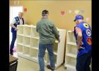 CCLP/LYNETTE SOWELL - Members of the Lone Star Travelers install the cubbies at the Copperas Cove MHMR Comprehensive Training Center.
