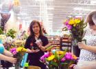 CCLP/LYNETTE SOWELL - Maggie Honea with the H-E-B Plus! Floral Department gives flower arranging tips during Tuesday morning’s Military Spouse Makeover held at Copperas Cove H-E-B Plus!. The event was sponsored by H-E-B and the USO Fort Hood.