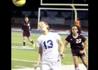 CCLP/TJ MAXWELL - Copperas Cove junior Kailey Walker hits a header in front of Killeen senior Teirra Norman during the Lady Dawgs’ 1-0 win.