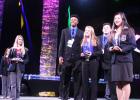 Copperas Cove High School DECA students Tariq Anthony, Rebekah Garris and Brandon Parton won top honors in the Entrepreneurship Business Growth Plan at the Texas DECA State Career Development Conference in San Antonio. DECA Executive Officer Victoria Meng, Southern Region Vice President, right, presented the award.