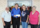 Optimist Club Past President Sandor Vegh; Friends of the Library President John Gallen; Club Manager Trish Lemire; and Optimist Club Member Sharon Sirianni Copperas Cove Optimist Club members present a $300 check to Friends of the Library to be used for purchase of new books for the Copperas Cove Public Library.