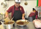 Owner Hensan Timo prepares and making his homemade Polynesian
and island sauces for the day at C&H Hawaiian Grill