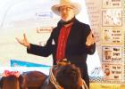 Local history buff, James Powell, shares highlights of Texas and local history with Clements-Parsons second graders on Thursday morning.