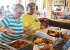 Sharon Beato and Pat Boston serve up breakfast at the CCACC flapjack fundraiser on Saturday.
