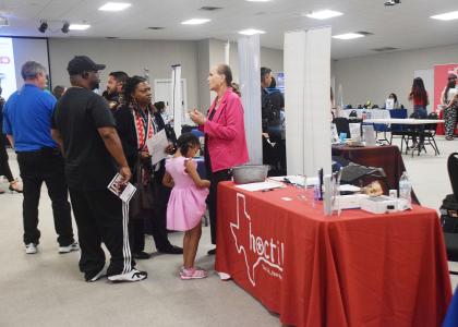 File Photo  -- Job seekers visit a table at last year’s Regional Hiring Event held by the Copperas Cove Economic Development Corporation. This year’s event is set for Wednesday, July 29, from 10 a.m. to 2 p.m. at the Copperas Cove Civic Center, located at 1206 W. Avenue B.