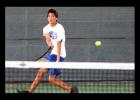 Copperas Cove’s James Llanos hits a running forehand during his singles match against Belton’s Travis Faris as part of the 12-6A matchup between the Bulldawgs and Tigers on Tuesday at the Dawg Tennis Center in Cove.