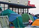 A tent city popped up overnight as patrons of Chick-Fil-A vied for a spot to be apart of the first 100 during the grand opening promotion receiving a free meal a week for a year.