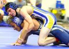 Copperas Cove’s Lane Teeter takes the back of Shoemaker’s Angel Rodriguez during their 113-pound matchup on Monday at Copperas Cove High School. Shoemaker edged out Cove with a 7-5 match win total. Ariel Lewis, Cory Smith, Lane Robinson and Adam Smalley also notched wins.